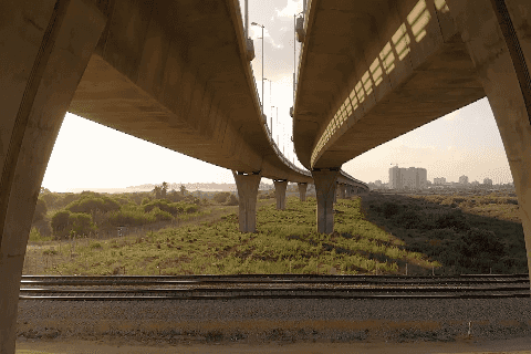 Image of a bridge with a railroad underneath